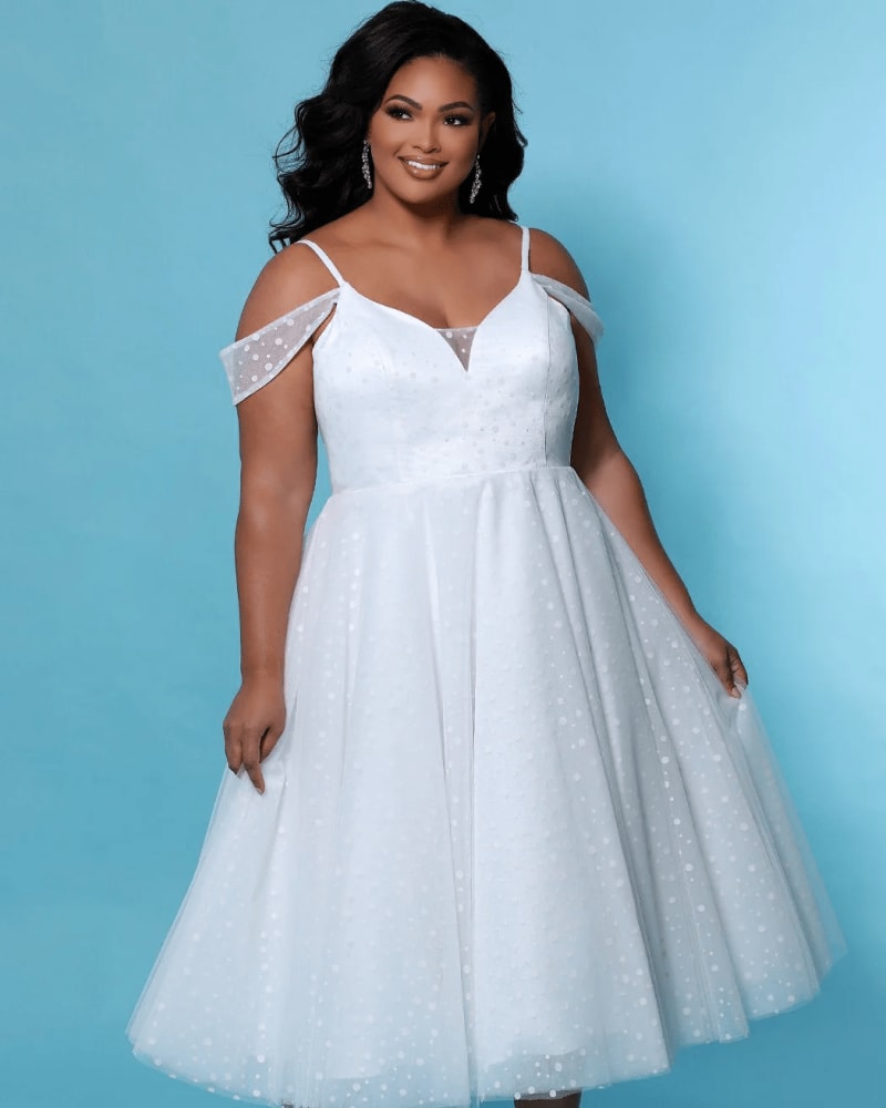 Front of a model wearing a size 32 Blossom Wedding Dress in Ivory by Sydney's Closet. | dia_product_style_image_id:285807